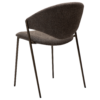 zone-dining-chair-major-brown-boucle-antique-brass-legs-angle ZONE dining chair upholstered in Major Brown bouclé fabric with antique brass legs, featuring a curved Scandinavian-inspired backrest for modern dining spaces.