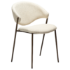 zone-dining-chair-simply-beige-boucle-antique-brass-legs ZONE dining chair upholstered in Simply Beige bouclé fabric with antique brass legs, featuring a curved Scandinavian-inspired backrest for modern dining spaces.