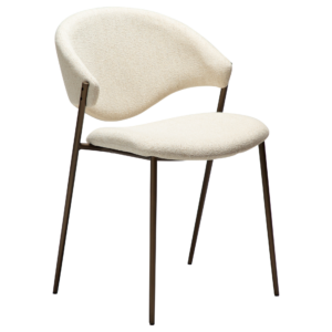ZONE dining chair upholstered in Simply Beige bouclé fabric with antique brass legs, featuring a curved Scandinavian-inspired backrest for modern dining spaces.