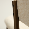 zone-dining-chair-simply-beige-boucle-antique-brass-legs-zoom ZONE dining chair upholstered in Simply Beige bouclé fabric with antique brass legs, featuring a curved Scandinavian-inspired backrest for modern dining spaces.
