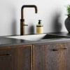 Lounge_546260128-23_02 Lounge antique brown Zamac cabinet handle with ergonomic concave grip for kitchen cabinets and bespoke furniture.