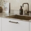 arcade-handle-matt-bronze-lifestyle Arcade matt bronze Zamac cabinet handle for kitchen cabinets, drawers, wardrobes, and bespoke furniture.