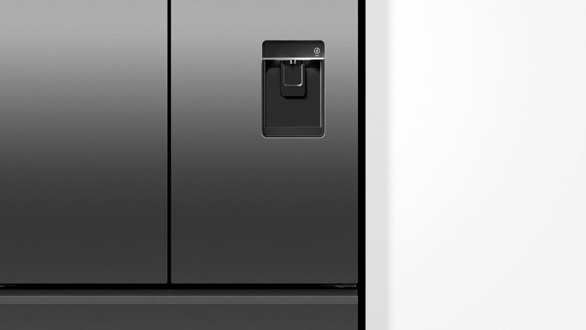 Fisher & Paykel 569L French door refrigerator freezer with slim water dispenser, automatic ice maker, and black steel finish.