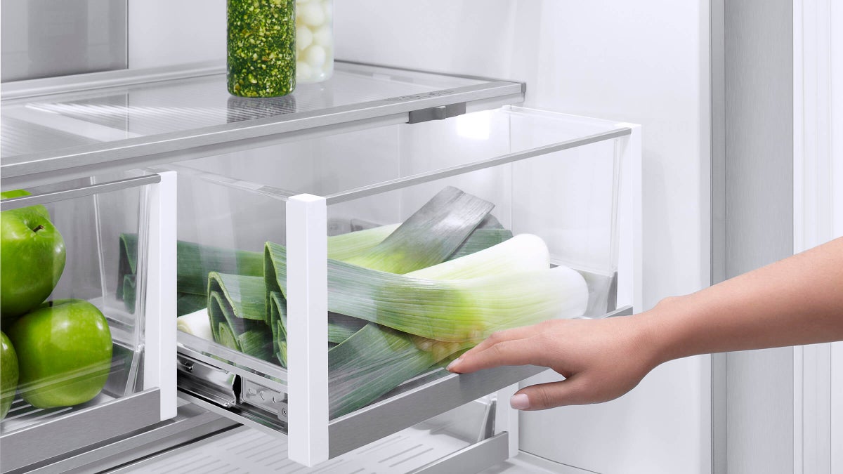 Fisher & Paykel 80cm integrated French door refrigerator freezer with automatic ice maker, slim water dispenser, and panel-ready design.