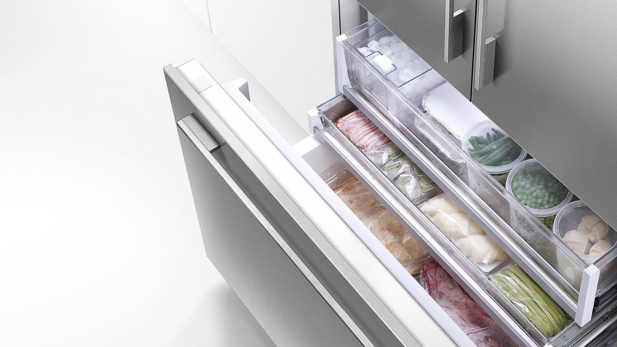 Fisher & Paykel 80cm integrated French door refrigerator freezer with automatic ice maker, slim water dispenser, and panel-ready design.