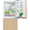 fisher-paykel-91cm-integrated-refrigerator-freezer-with-ice-open Fisher & Paykel 91cm integrated refrigerator freezer with automatic ice maker, panel-ready design, and bottom freezer drawer for modern kitchens.