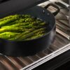fisher-paykel-contemporary-compact-combi-microwave-oven-capacity Fisher & Paykel contemporary compact combi microwave oven with convection cooking, touchscreen controls, and sleek black glass finish.