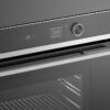 fisher-paykel-contemporary-compact-combi-microwave-oven-zoom Fisher & Paykel contemporary compact combi microwave oven with convection cooking, touchscreen controls, and sleek black glass finish.