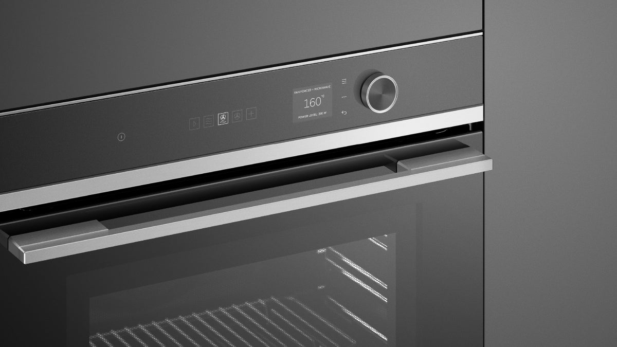 fisher-paykel-contemporary-compact-combi-microwave-oven-zoom Fisher & Paykel contemporary compact combi microwave oven with convection cooking, touchscreen controls, and sleek black glass finish.