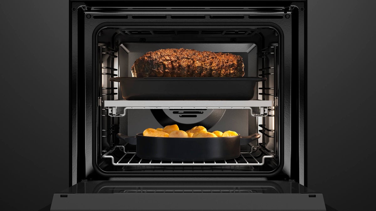fisher-paykel-contemporary-oven-16-function-capacity Fisher & Paykel contemporary oven with 16 cooking functions, touchscreen controls, and a sleek black glass finish.