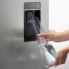 fisher-paykel-integrated-french-door-refrigerator-freezer-ice-water-dispenser Fisher & Paykel integrated French door refrigerator freezer with automatic ice maker, internal water dispenser, and panel-ready design for modern kitchens.