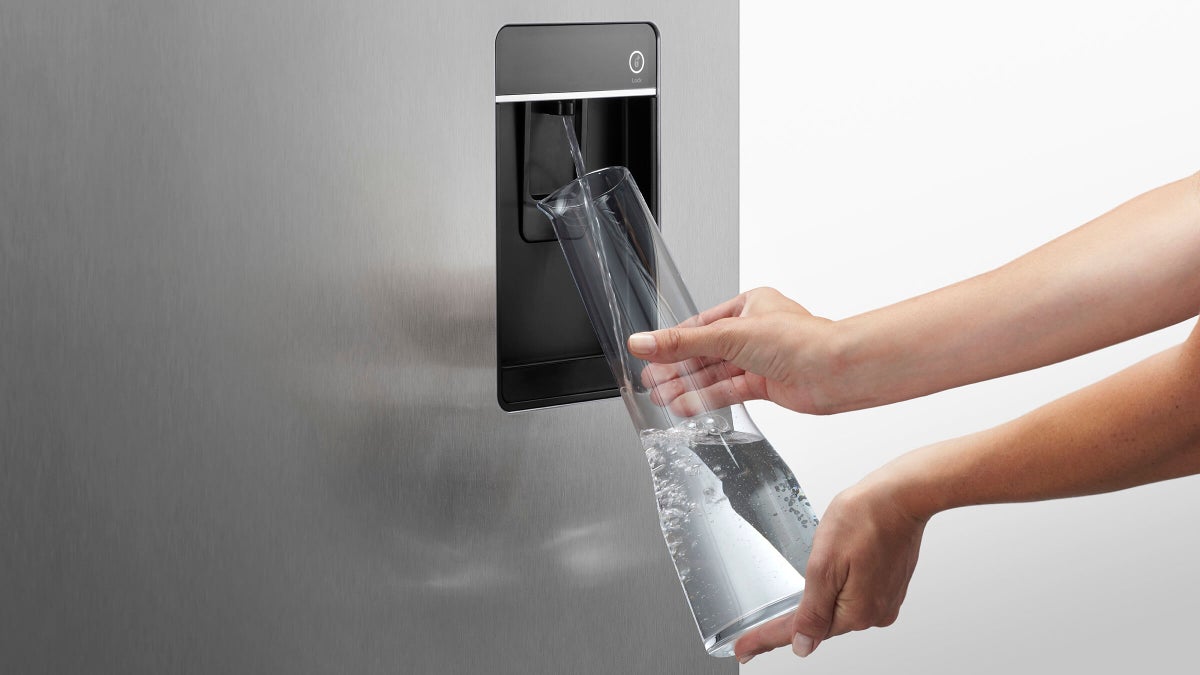 fisher-paykel-integrated-french-door-refrigerator-freezer-ice-water-dispenser Fisher & Paykel integrated French door refrigerator freezer with automatic ice maker, internal water dispenser, and panel-ready design for modern kitchens.