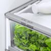 Fisher & Paykel integrated French door refrigerator freezer with automatic ice maker, internal water dispenser, and panel-ready design for modern kitchens.
