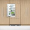 fisher-paykel-integrated-french-door-refrigerator-freezer-unit-half-open Fisher & Paykel integrated French door refrigerator freezer with panel-ready design, bottom freezer drawer, and flexible food storage for modern kitchens.