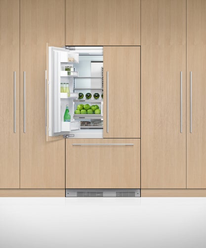 fisher-paykel-integrated-french-door-refrigerator-freezer-unit-half-open Fisher & Paykel integrated French door refrigerator freezer with panel-ready design, bottom freezer drawer, and flexible food storage for modern kitchens.