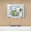 fisher-paykel-integrated-french-door-refrigerator-freezer-unit-open Fisher & Paykel integrated French door refrigerator freezer with panel-ready design, bottom freezer drawer, and flexible food storage for modern kitchens.