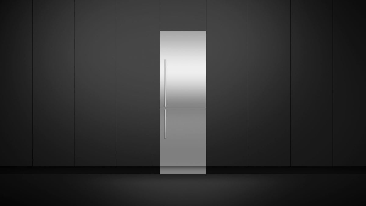 fisher-paykel-integrated-refrigerator-freezer-ice-water-unit-close Fisher & Paykel integrated refrigerator freezer with panel-ready design, internal water dispenser, automatic ice maker, and flexible food storage.
