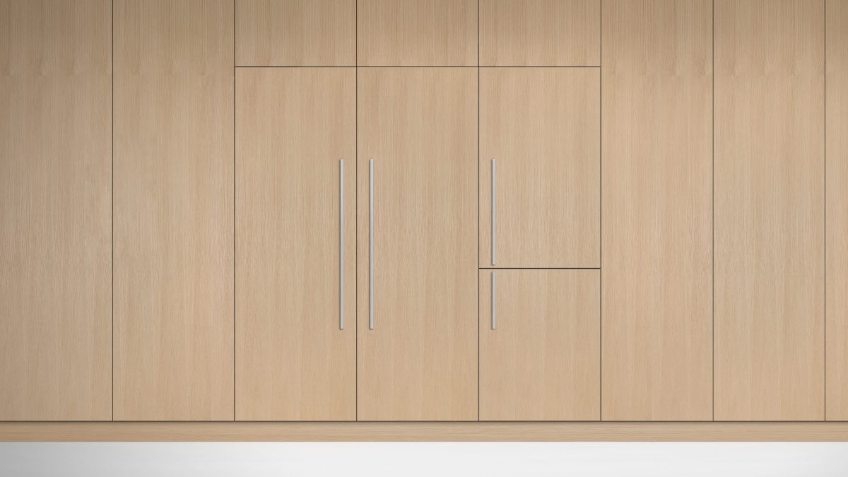 fisher-paykel-integrated-triple-zone-refrigerator-unit-close Fisher & Paykel integrated triple zone refrigerator with panel-ready design, internal water dispenser, and flexible food storage for modern kitchens.