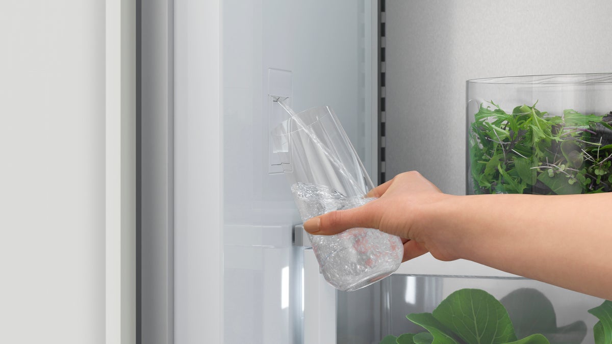 fisher-paykel-integrated-triple-zone-refrigerator-water Fisher & Paykel integrated triple zone refrigerator with panel-ready design, internal water dispenser, and flexible food storage for modern kitchens.