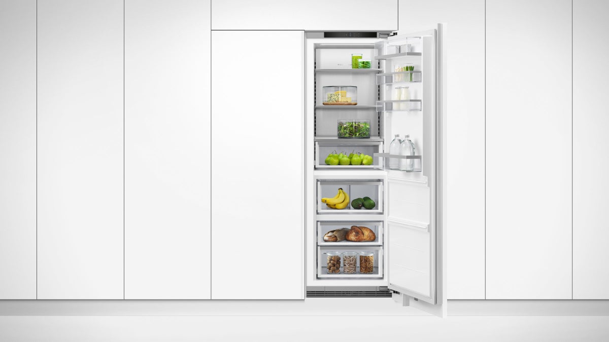 fisher-paykel-integrated-triple-zone-refrigerator-white-unit-open Fisher & Paykel integrated triple zone refrigerator with panel-ready design, internal water dispenser, and flexible food storage for modern kitchens.