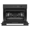 fisher-paykel-minimal-compact-combi-microwave-oven-black-open Fisher & Paykel Minimal Compact Combi Microwave Oven in black with 19 cooking functions, Wi-Fi connectivity, and touchscreen controls.