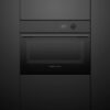 fisher-paykel-minimal-compact-combi-microwave-oven-black-unit Fisher & Paykel Minimal Compact Combi Microwave Oven in black with 19 cooking functions, Wi-Fi connectivity, and touchscreen controls.