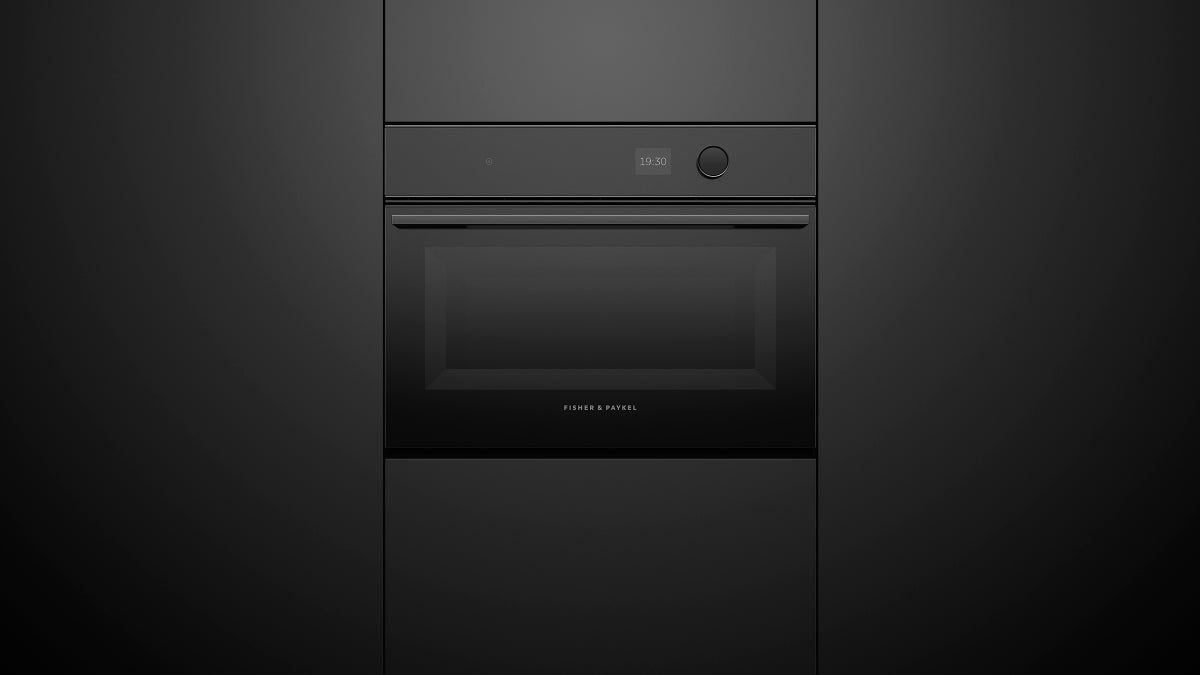 fisher-paykel-minimal-compact-combi-microwave-oven-black-unit Fisher & Paykel Minimal Compact Combi Microwave Oven in black with 19 cooking functions, Wi-Fi connectivity, and touchscreen controls.