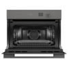 fisher-paykel-minimal-compact-combi-microwave-oven-grey-open Fisher & Paykel Minimal grey compact combi microwave oven with 19 cooking functions, Wi-Fi connectivity, and touchscreen controls.