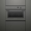 fisher-paykel-minimal-compact-combi-microwave-oven-grey-unit Fisher & Paykel Minimal grey compact combi microwave oven with 19 cooking functions, Wi-Fi connectivity, and touchscreen controls.