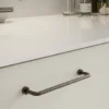 lounge-handle-antique-brown-128mm-160mm-lifestyle Lounge antique brown Zamac cabinet handle with ergonomic concave grip for kitchen cabinets and bespoke furniture.