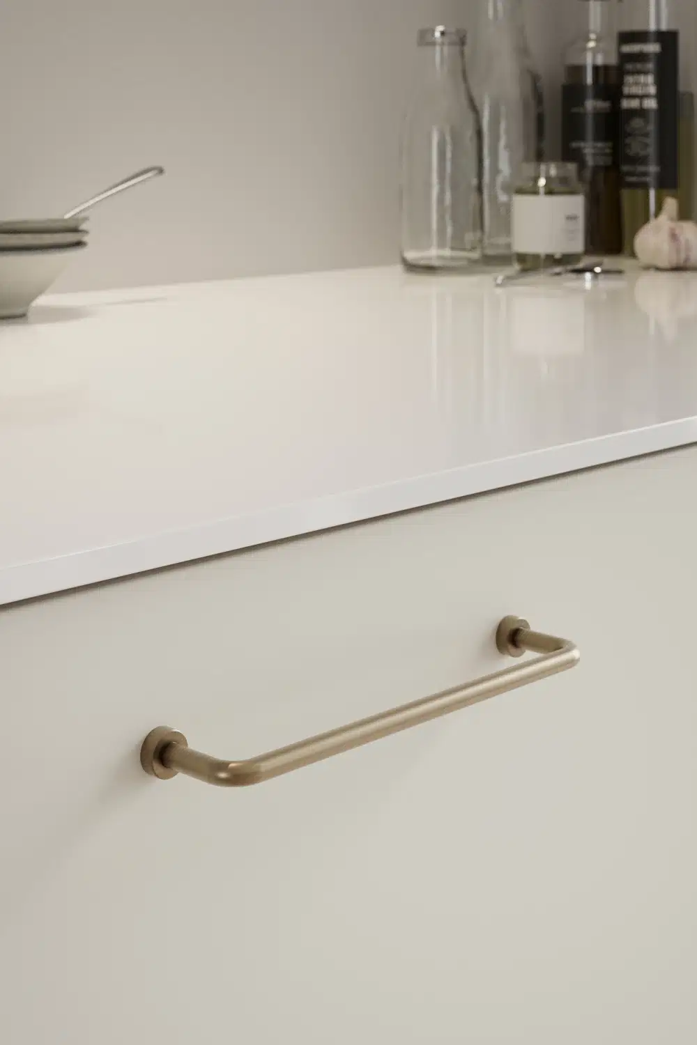 Lounge patinated brass Zamac cabinet handle with ergonomic concave grip for kitchen cabinets and bespoke furniture.