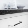 lounge-handle-silk-polished-128mm-160mm-lifestyle Lounge silk polished Zamac cabinet handle with ergonomic concave grip for kitchen cabinets and bespoke furniture.