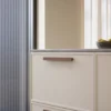 Shelter clear lacquered walnut profile handle for kitchen cabinets, drawers, wardrobes, and bespoke furniture.