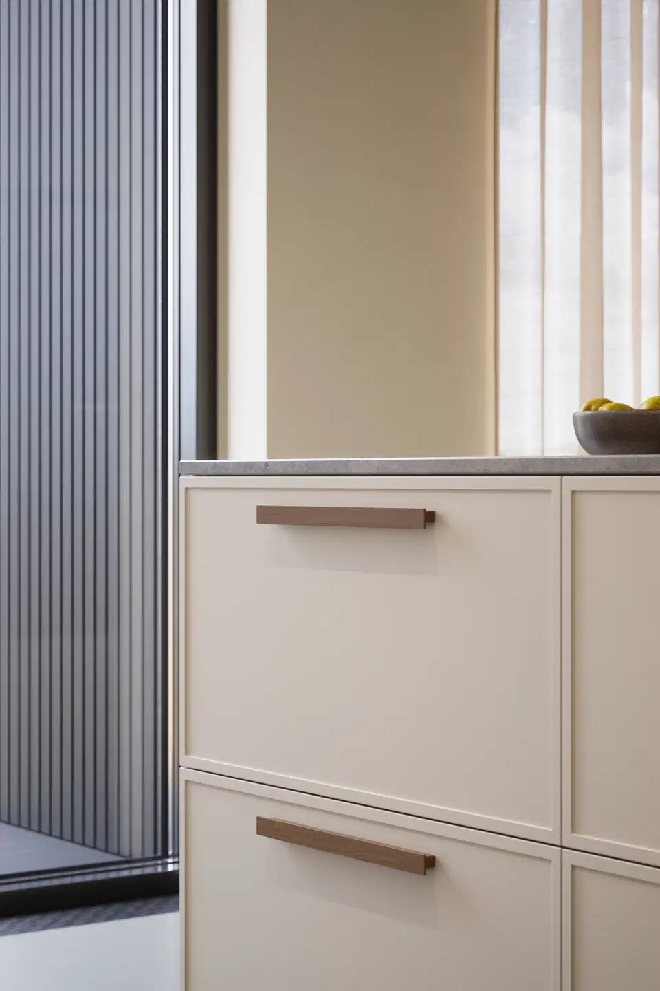 Shelter clear lacquered walnut profile handle for kitchen cabinets, drawers, wardrobes, and bespoke furniture.