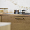 Terra matt bronze cast iron cabinet handle for kitchen cabinets, drawers, wardrobes, and bespoke furniture.