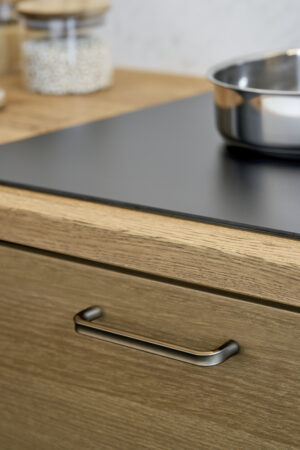 Terra matt bronze cast iron cabinet handle for kitchen cabinets, drawers, wardrobes, and bespoke furniture.