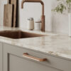 Terra brushed copper cast iron cabinet handle for kitchen cabinets, drawers, wardrobes, and bespoke furniture.