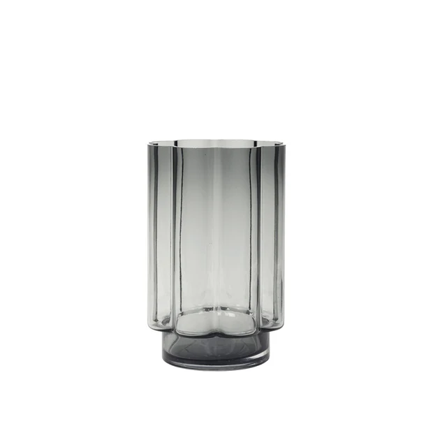 Anya Hurricane Candle Holder in grey mouthblown glass with sculptural curved detailing