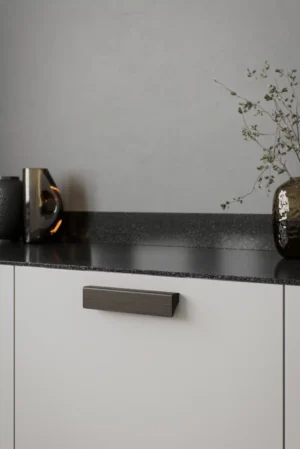 Baum dark brown oak cabinet handle for kitchen cabinets, drawers, wardrobes, and bespoke furniture.