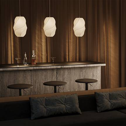 Bloom Oval Pendant Light with tall sculptural white fabric shade and flowing organic form.