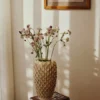 Dorthea Vase in cream reactive glazed ceramic with textured scale-like detailing