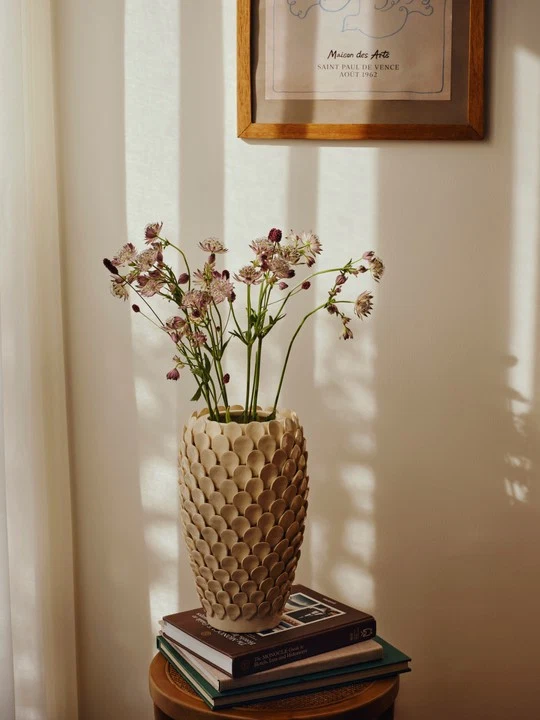 Dorthea Vase in cream reactive glazed ceramic with textured scale-like detailing