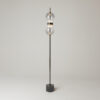 double-moon-floor-lamp-black-lit Double Moon black floor lamp with sculptural glass shade and contemporary metal frame.
