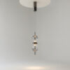 Double Moon pendant light with two clear glass spheres, slim black frame and contemporary design.