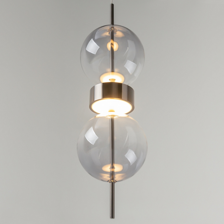 Double Moon pendant light with two clear glass spheres, slim black frame and contemporary design.