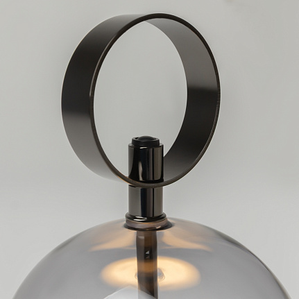 double-moon-rechargeable-table-lamp-black-handle Double Moon rechargeable table lamp with glass shade, black metal frame and contemporary sculptural design.