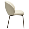 Era Chair in Simply Beige upholstery with rounded backrest, curved seat and slim Antique Brass legs.