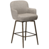 Ethos Swivel Counterstool in Pebble Earth upholstery with curved armrests, footrest and Antique Brass legs.