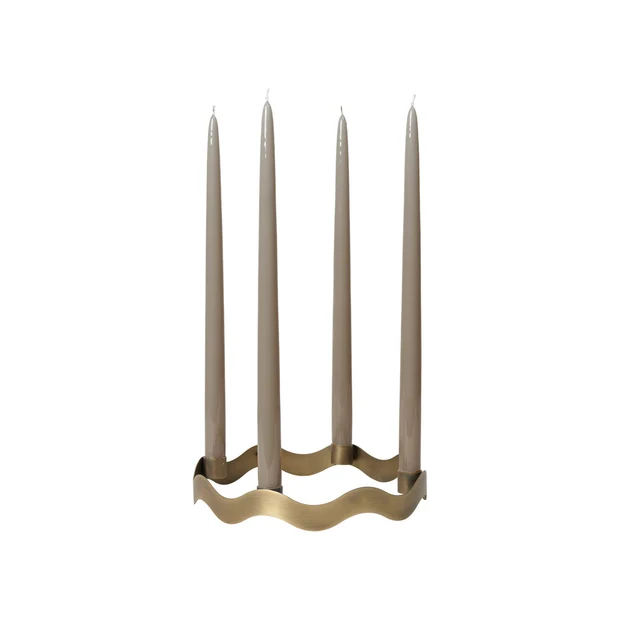halo-candle-holder-antique-brass Halo four-candle holder in antique brass with sculptural wave-shaped iron frame
