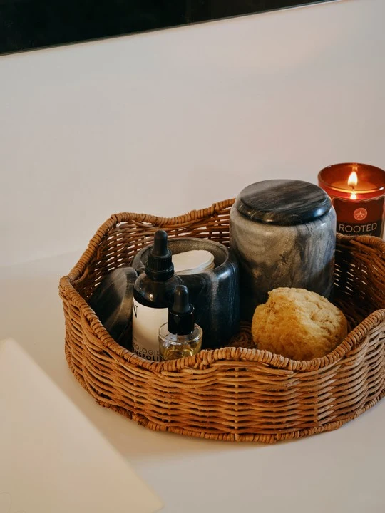 hedvig-canister-black-marble-lifestyle Hedvig Canister in black marble with a rounded lid and natural stone veining